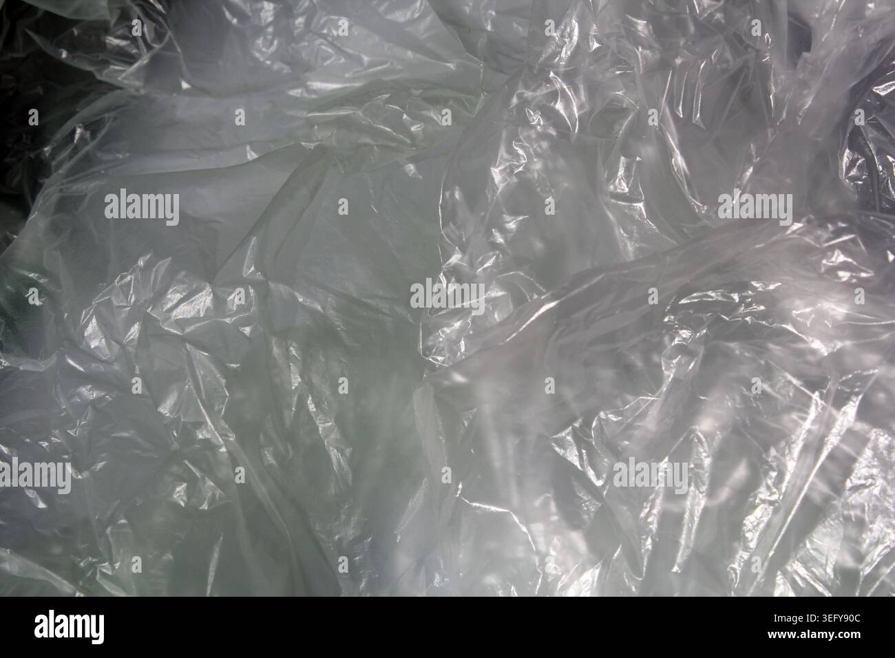 Full frame background texture of crumpled clear plastic bags Stock Photo