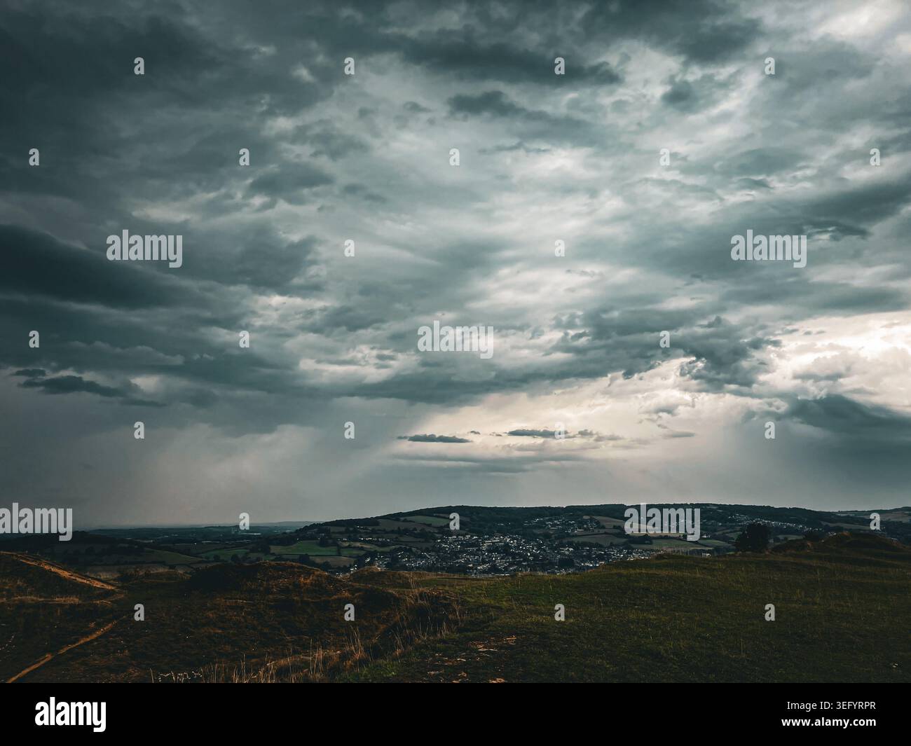 Sun shining through heavy rain hi-res stock photography and images - Alamy