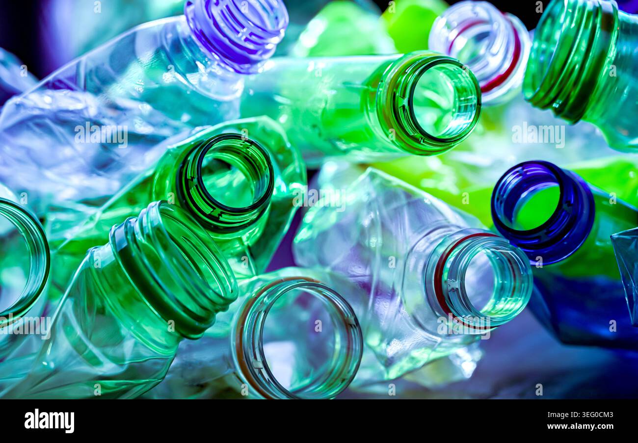 Empty colored drink bottles. Recyclable plastic waste. Stock Photo