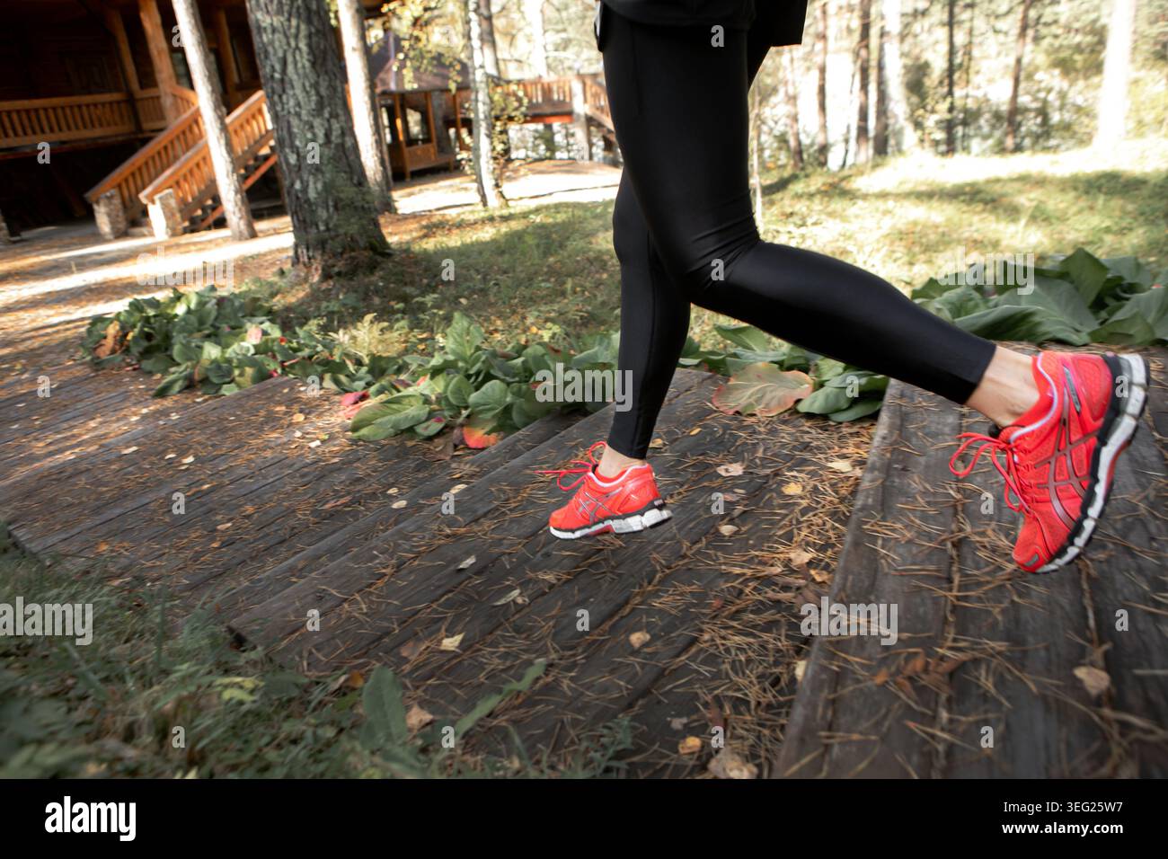 Woman running down hi-res stock photography and images - Alamy
