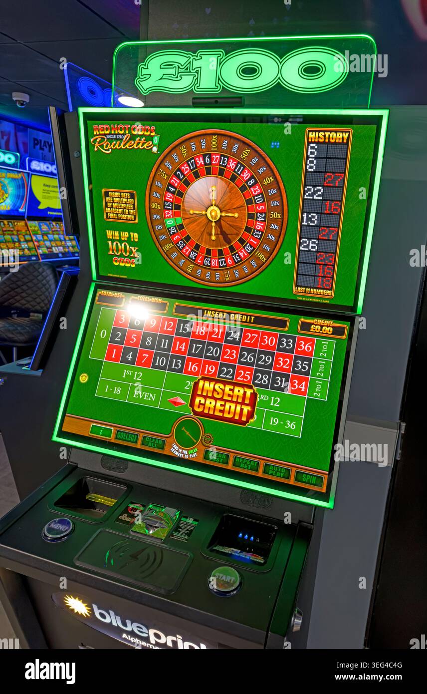 Casino-style roulette slot machine advertises a £100 prize and 18+ play, illustrating gambling temptation and addiction harms Stock Photo