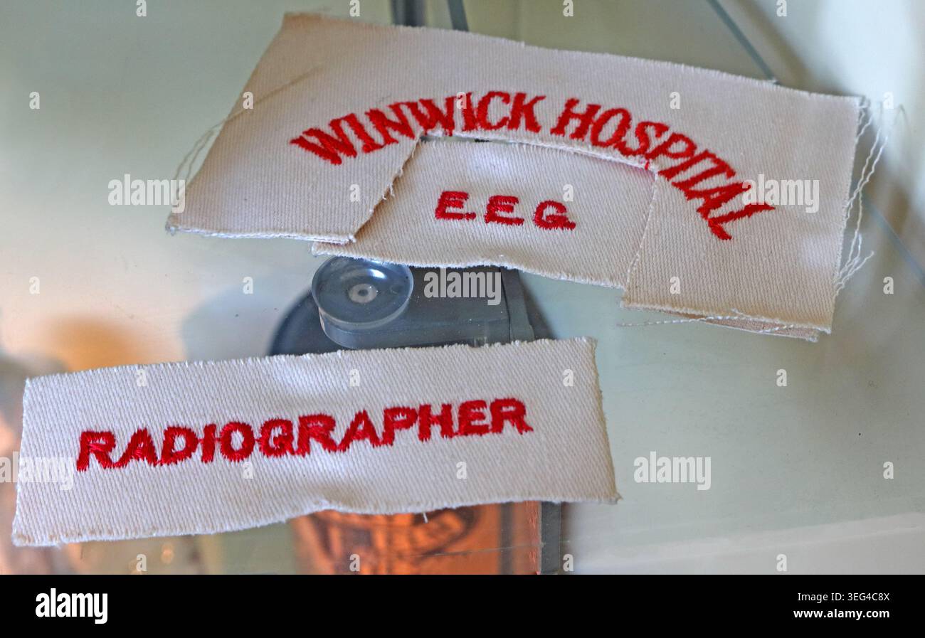Winwick Hospital EEG and radiographer uniform badges, memorabilia from the former psychiatric hospital near Warrington, England, UK. Stock Photo