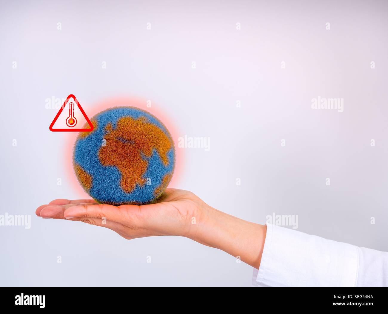 Global warming concept with overheating earth in human hand and warning ...