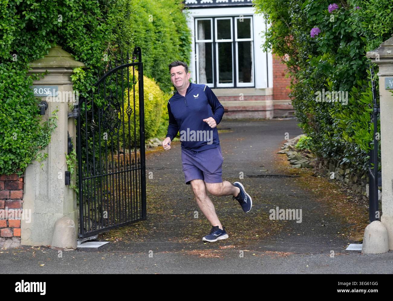 mayor-of-greater-manchester-andy-burnham-outside-his-house-in