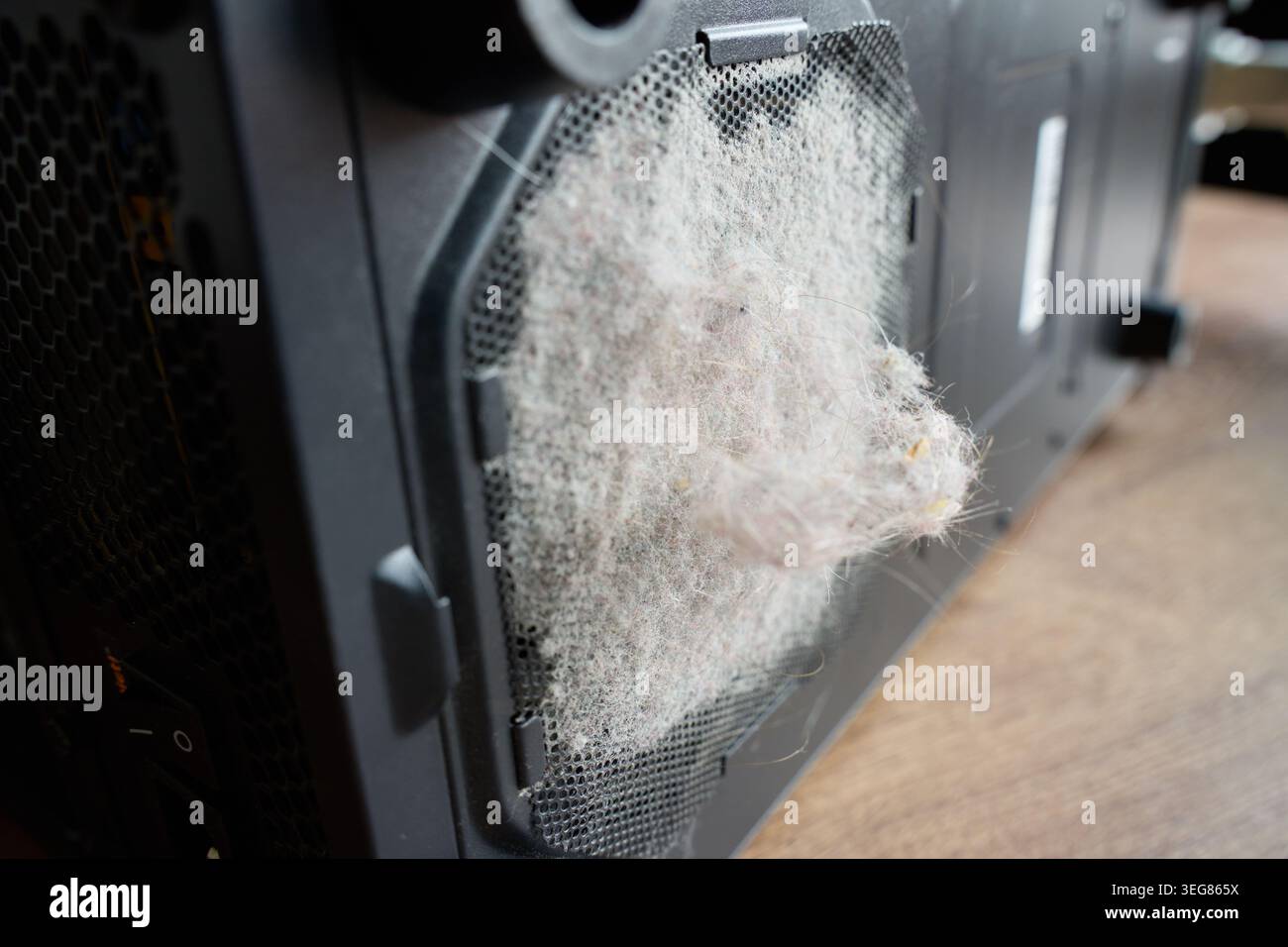 Dust buildup on desktop computer case ventilation grille Stock Photo