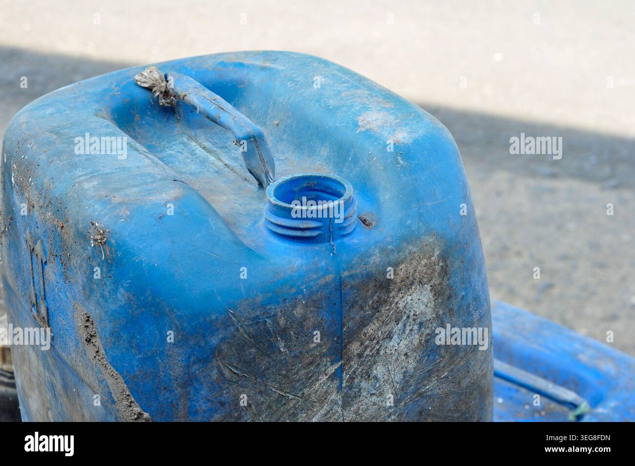 Old Blue Plastic Jerry Can Close Up Stock Photo