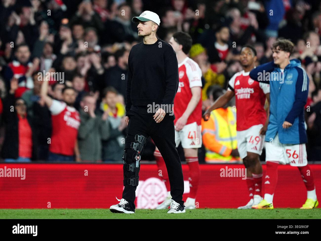 Arsenal's Ben White wearing a protective leg brace after the Premier ...