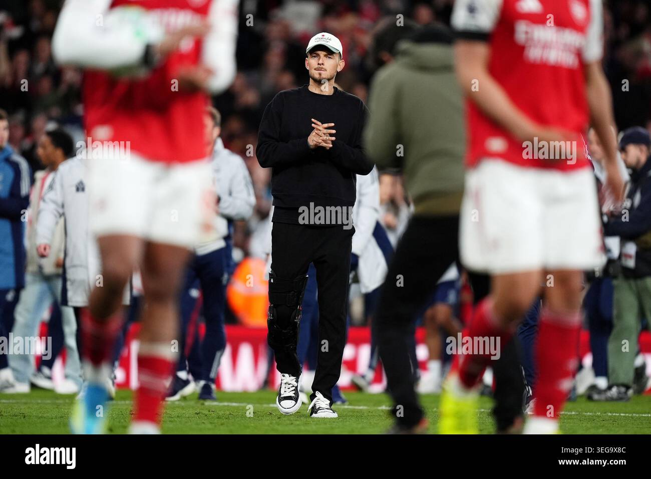 Arsenal's Ben White wearing a protective leg brace after the Premier ...