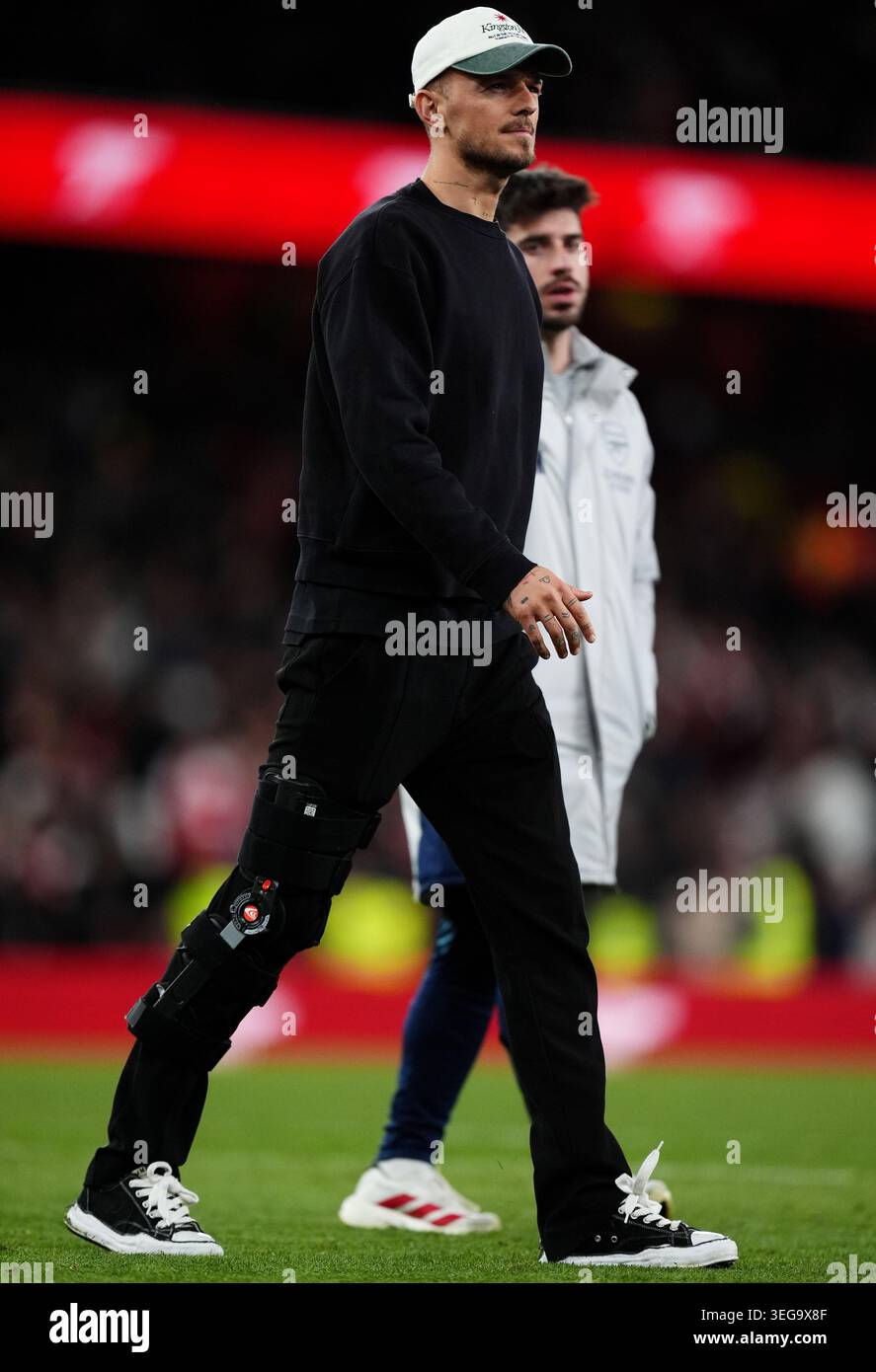 Arsenal's Ben White wearing a protective leg brace after the Premier ...