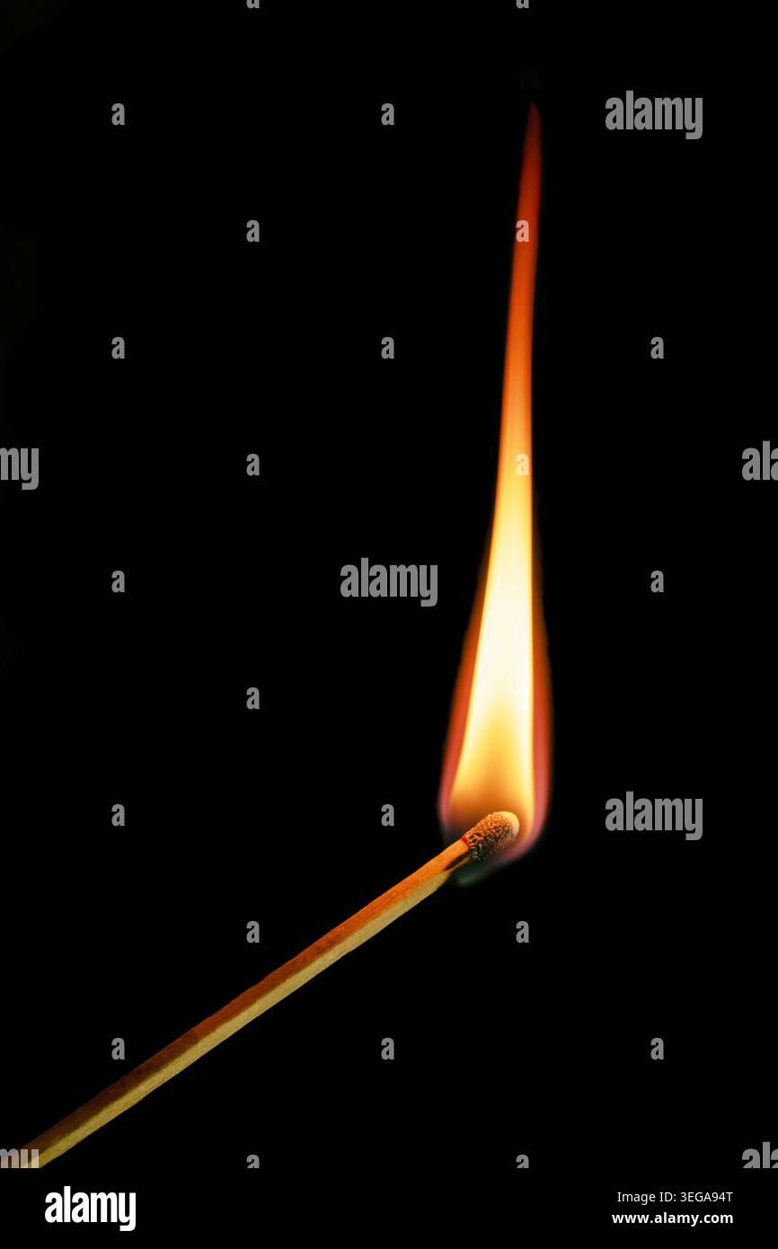 Burning Match Flame Isolated On Black Background Stock Photo