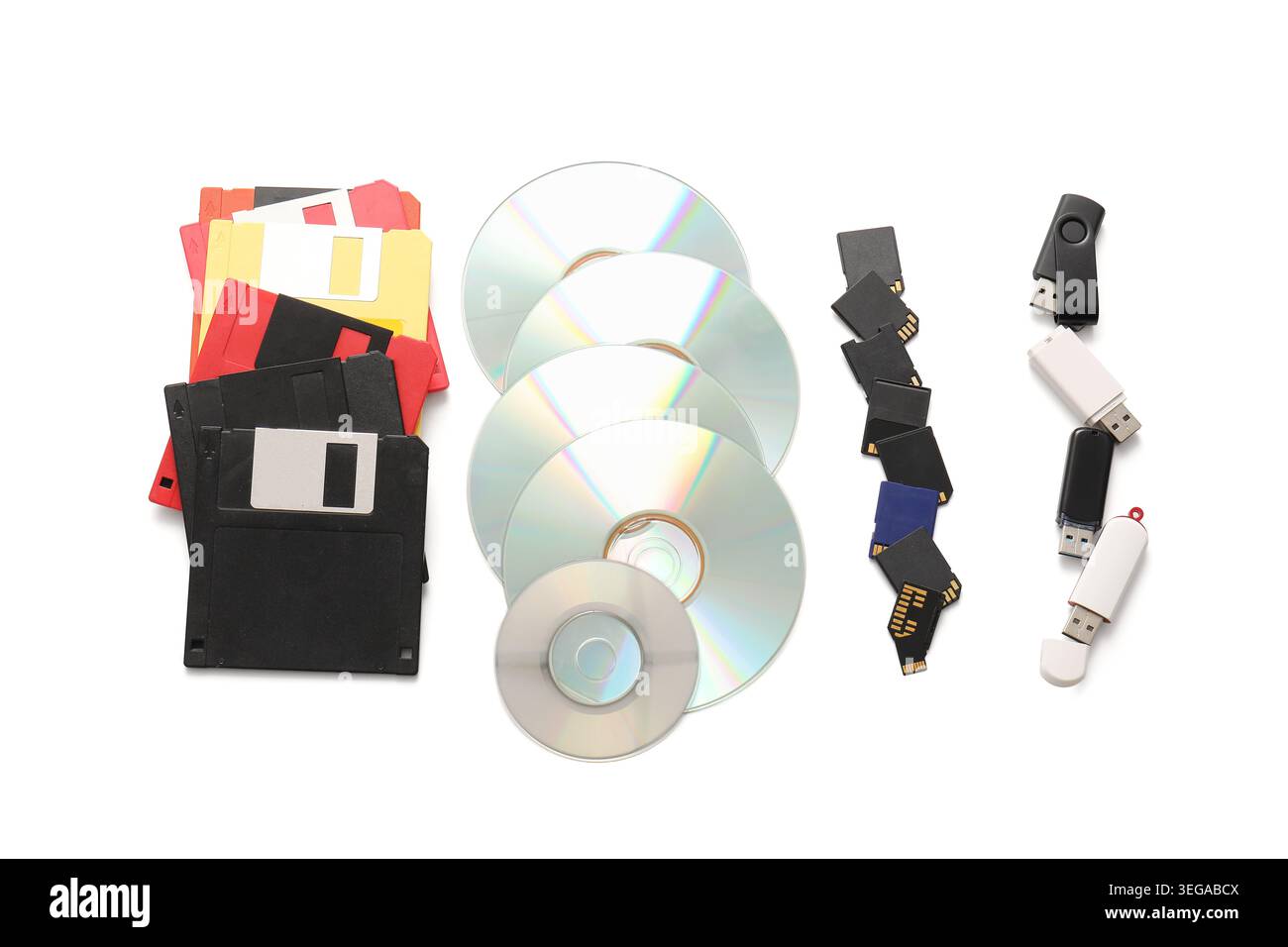 USB flash drives, CD and floppy disks on white background Stock Photo