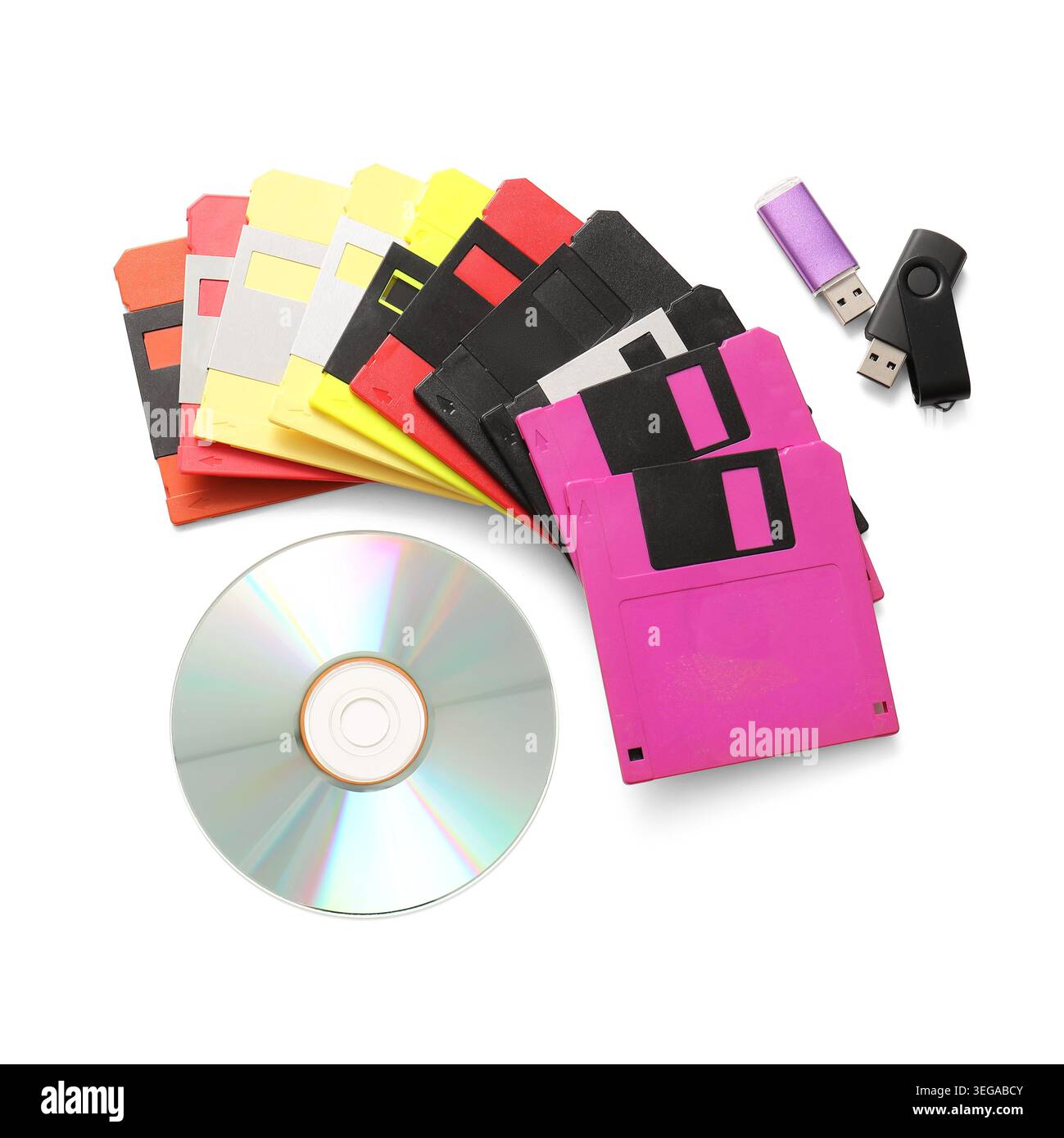 USB flash drives, CD and floppy disks on white background Stock Photo