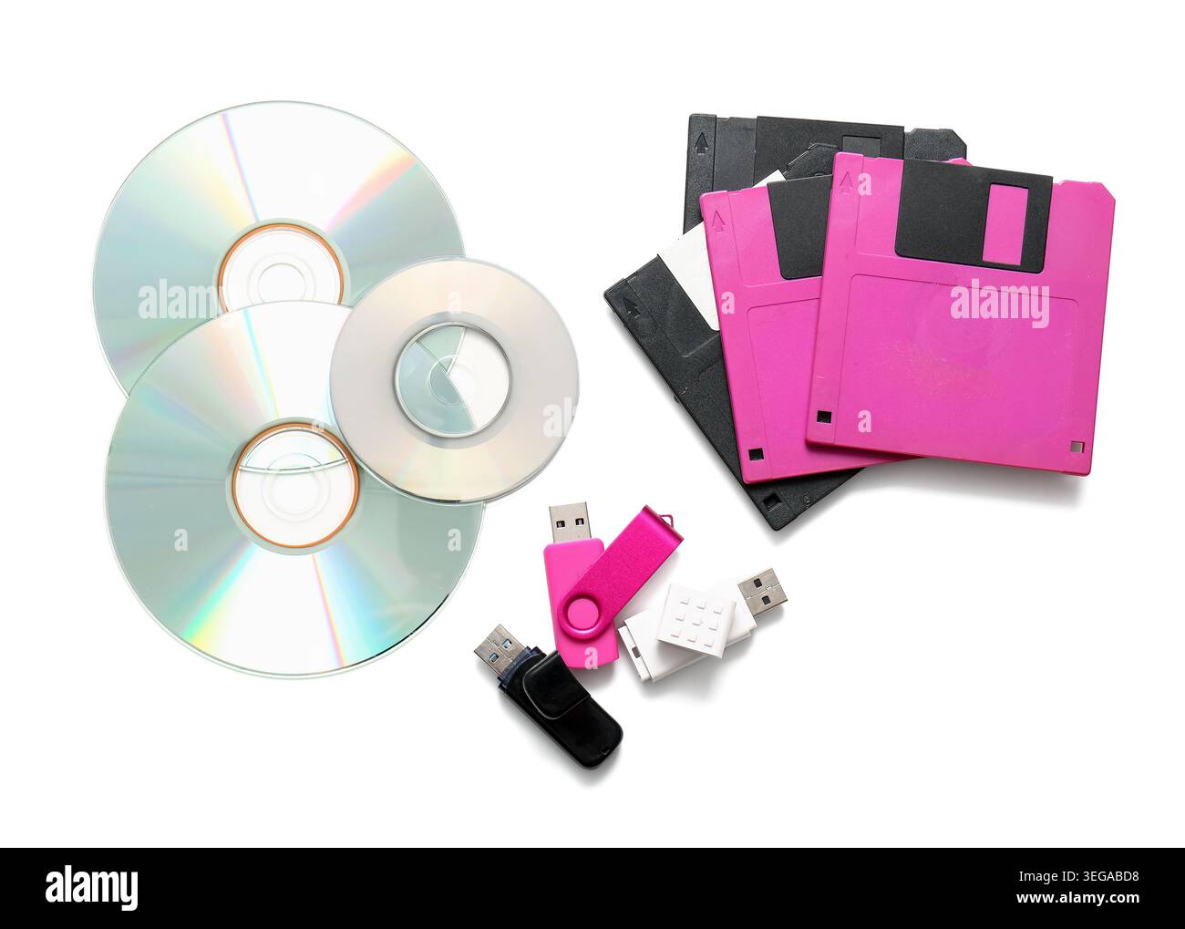 USB flash drives, CD and floppy disks on white background Stock Photo