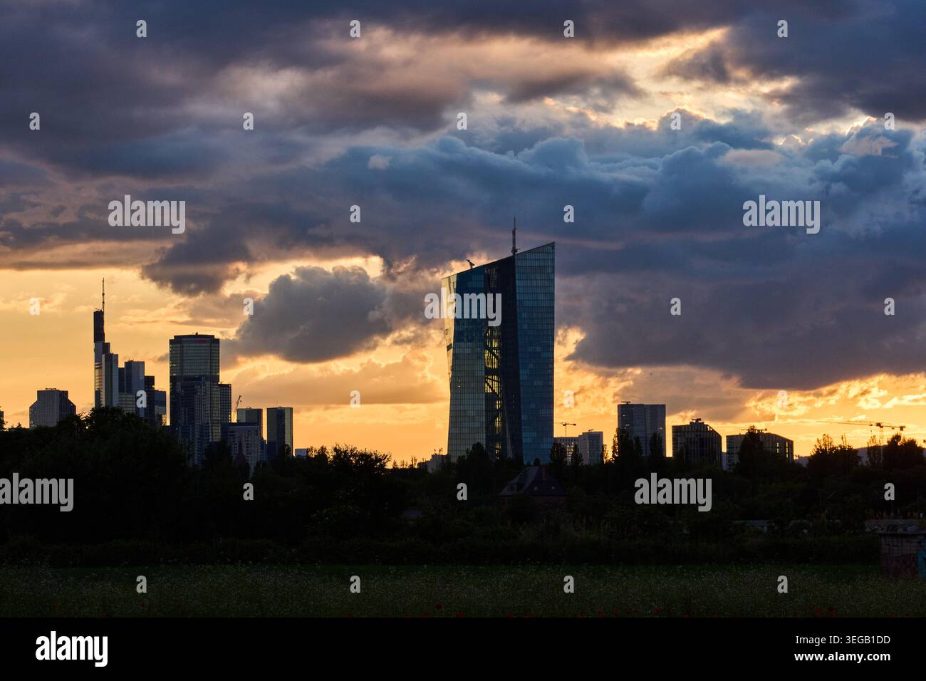 Dark clouds drift over the buildings of the banking district in ...