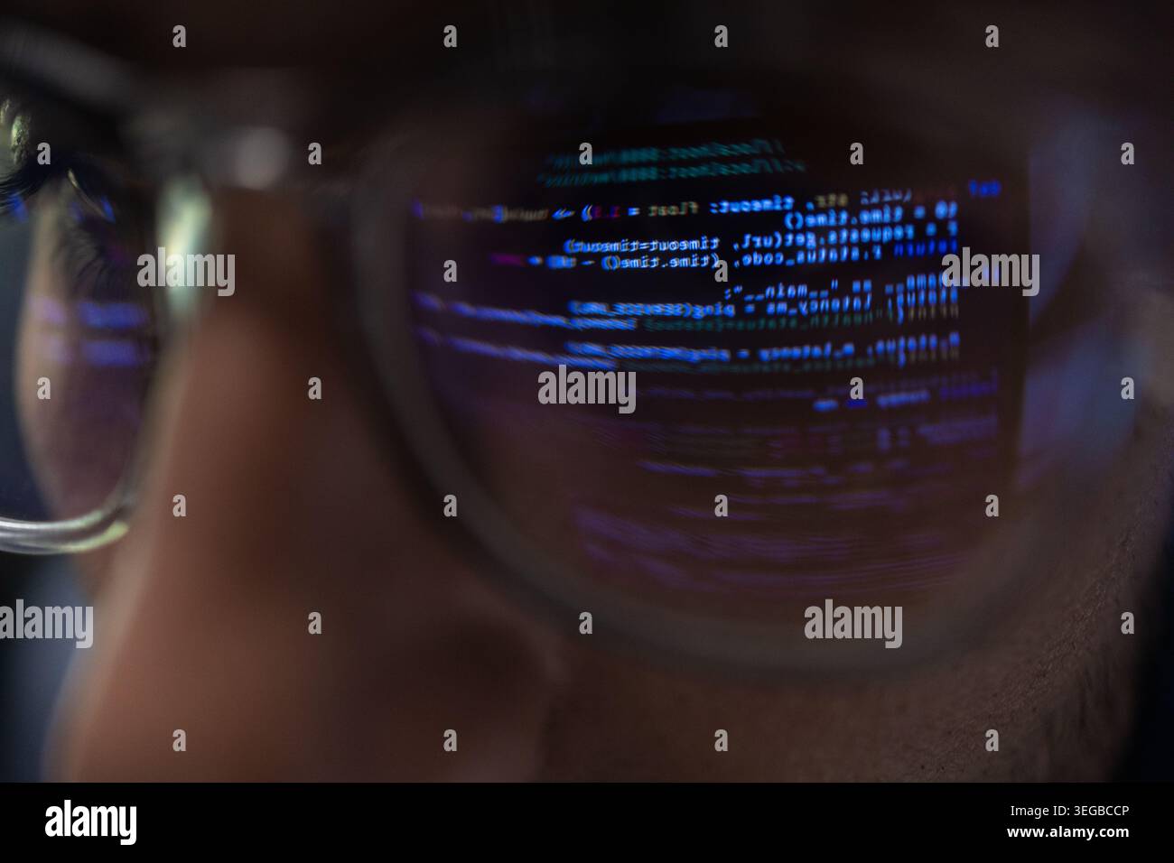 Close Up Of Programmer Glasses With Code Reflection On Lens Stock Photo