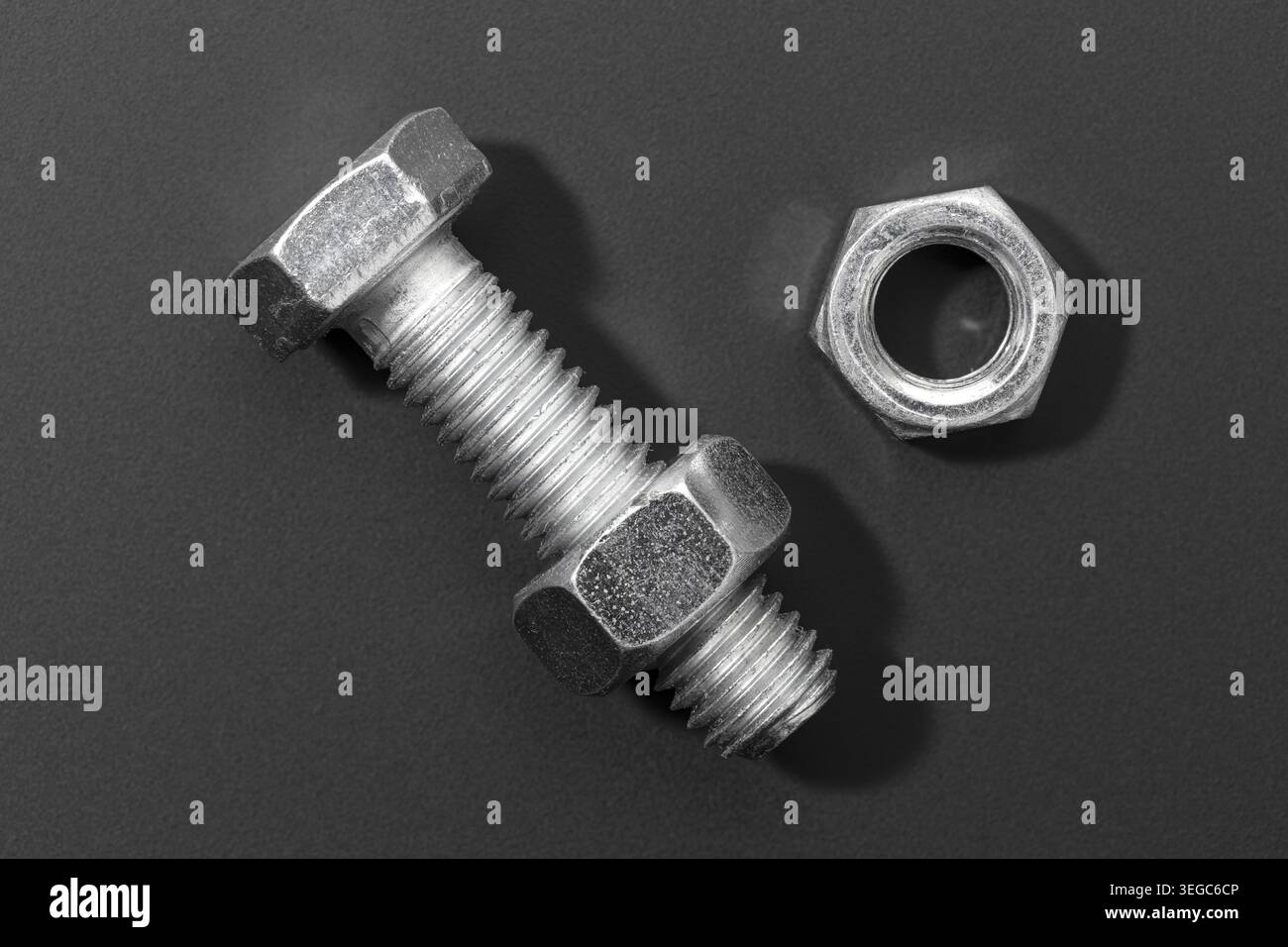 Metric Bolt and nut isolated on black background Stock Photo