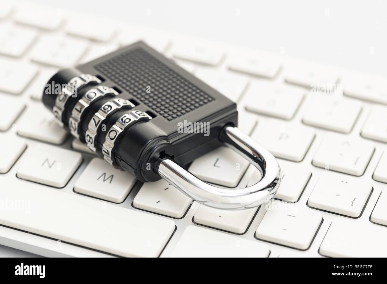 Closed padlock on computer keyboard. Cyber security concept Stock Photo