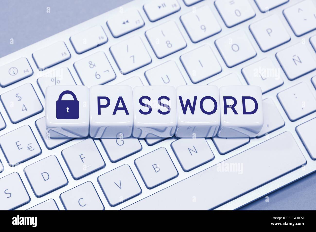 Password word and Closed padlock icon on cube blocks on computer keyboard. Computer data protection concept Stock Photo