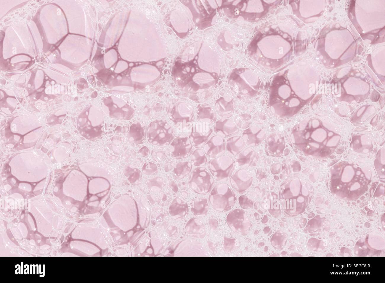 Skin care soap bubbles on pink background background texture. Full frame Stock Photo