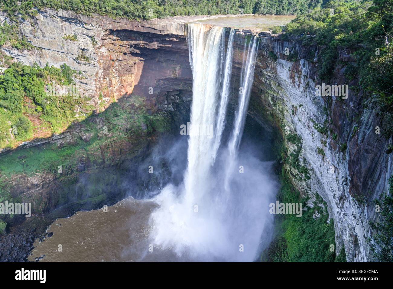 Water rushing over Kaieteur Falls at the rate of 23,400 cubic feet a ...