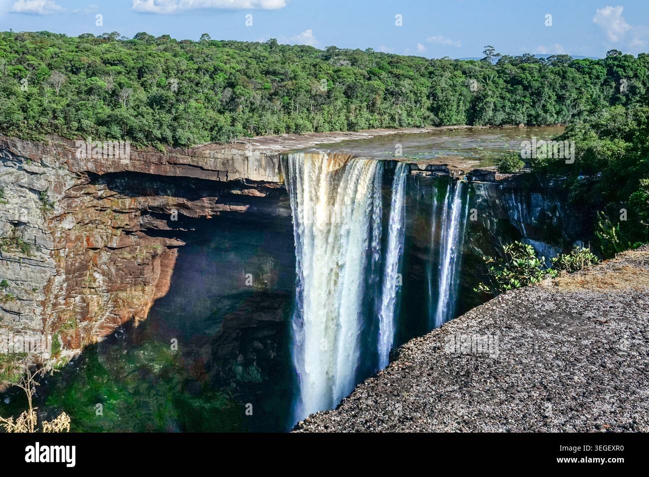 Water rushing over Kaieteur Falls at the rate of 23,400 cubic feet a ...