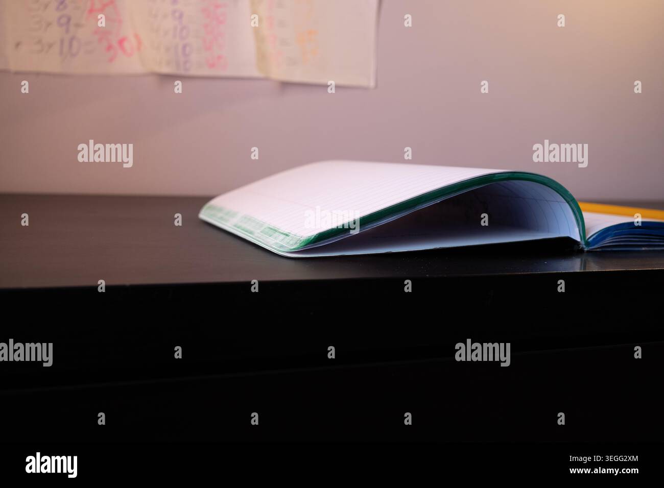 Open notebook with white blank pages lying on office desk Stock Photo