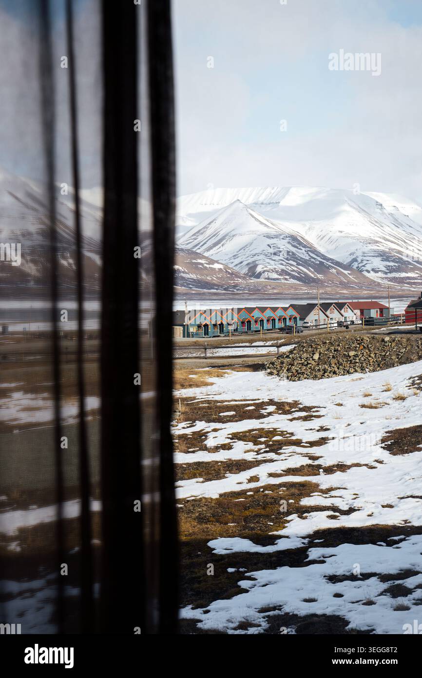 View from hotel of colourful wooden houses in Longyearbyen, Svalbard Stock Photo