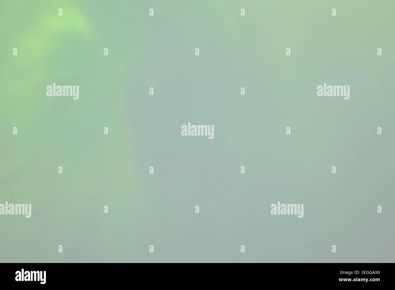 Soft minimalist light green gradient background with subtle light variations Stock Photo