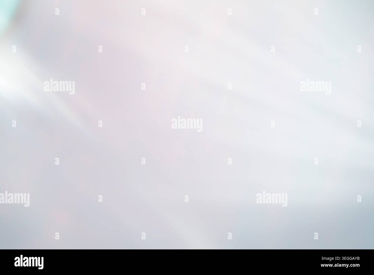 Abstract soft pale blue gradient background with smooth diagonal light rays and subtle textures Stock Photo