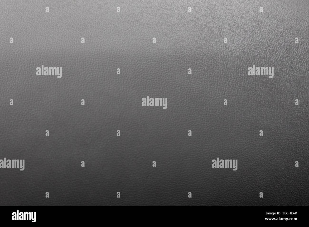 Grey gritty texture creating an abstract noise background surface Stock Photo