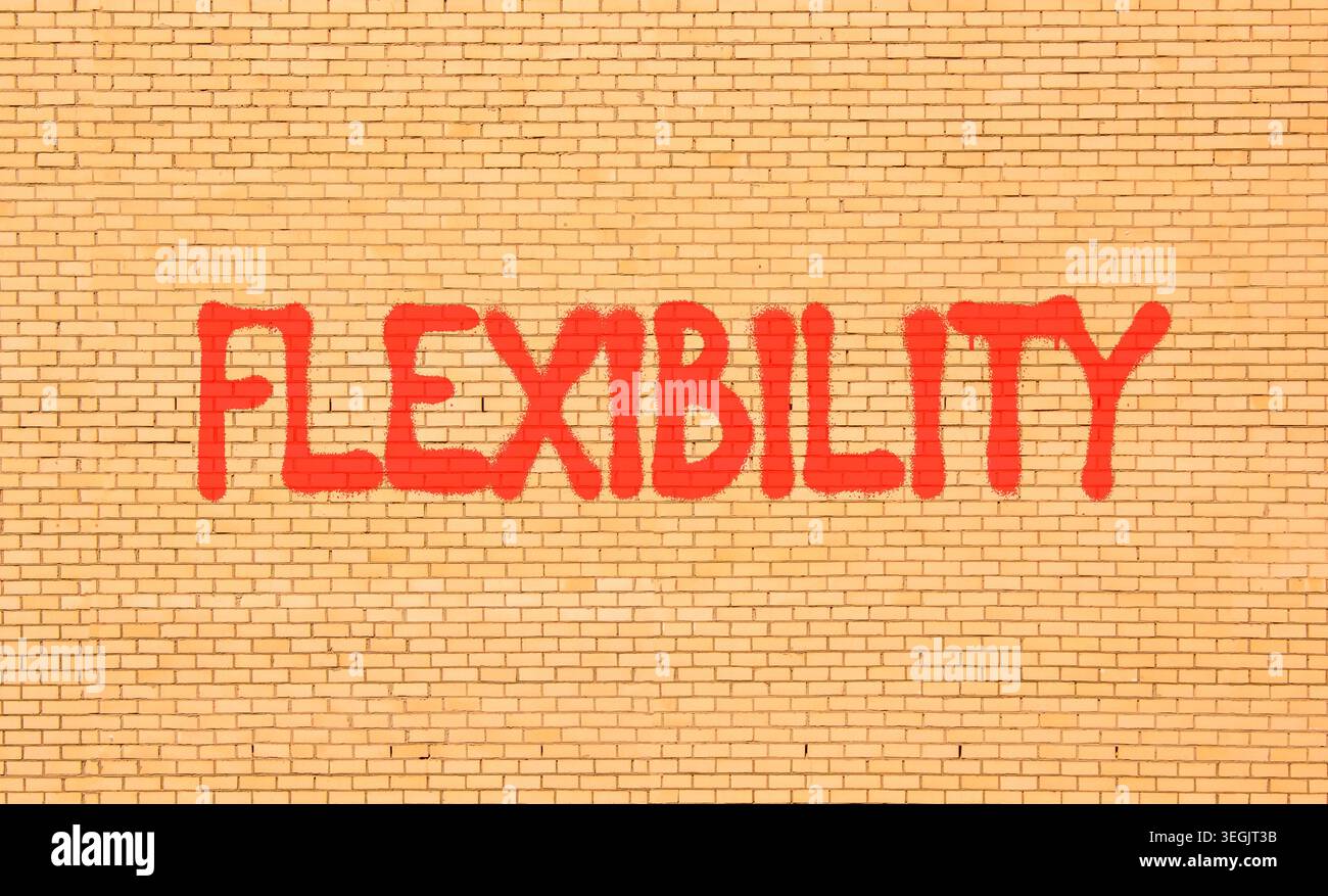 Flexibility symbol. Concept word Flexibility on beautiful big brown ...