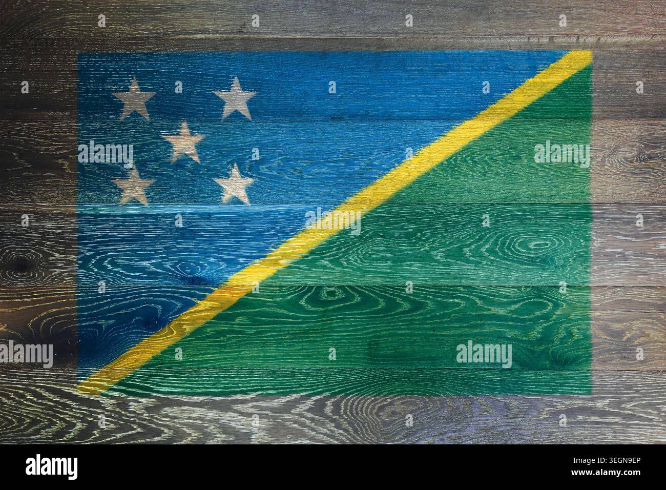 Solomon islands flag on rustic old wood surface background Stock Photo