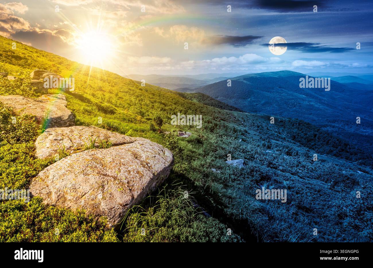 day meet night. carpathian mountain summer solstice landscape. alpine meadow with huge stones among the grass on top of the hillside near the peak of Stock Photo