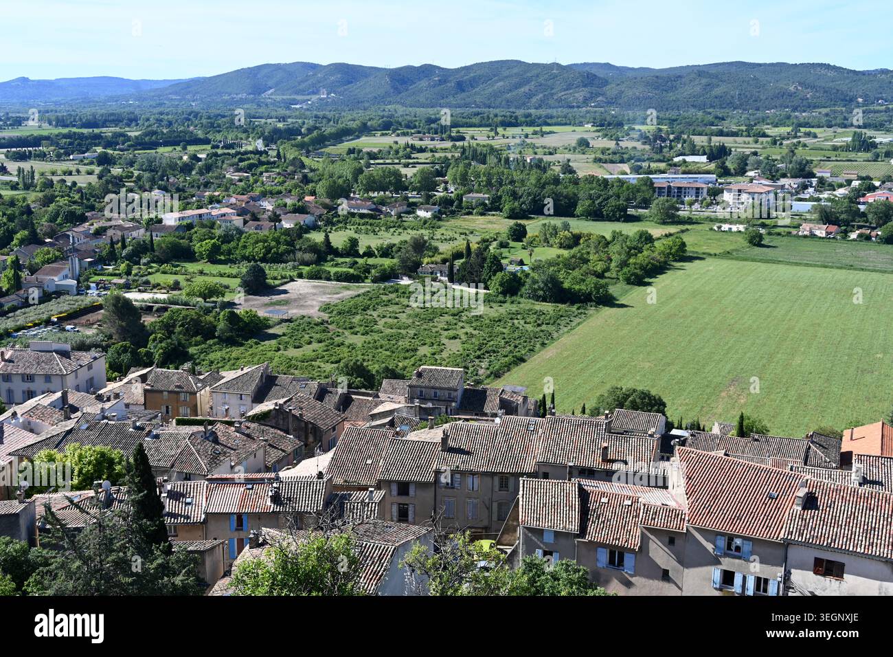Panorama or Panoramic view over Rooftops of Cadenet, the Durance Valley & Agricultural Plain Luberon Provence France Stock Photo