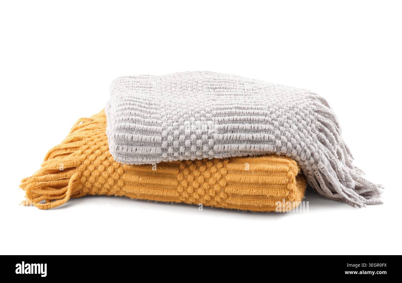 Soft knitted blankets isolated on white background Stock Photo