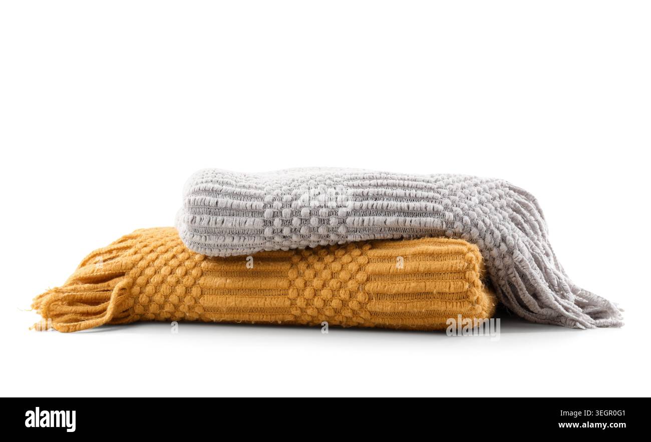 Soft knitted blankets isolated on white background Stock Photo