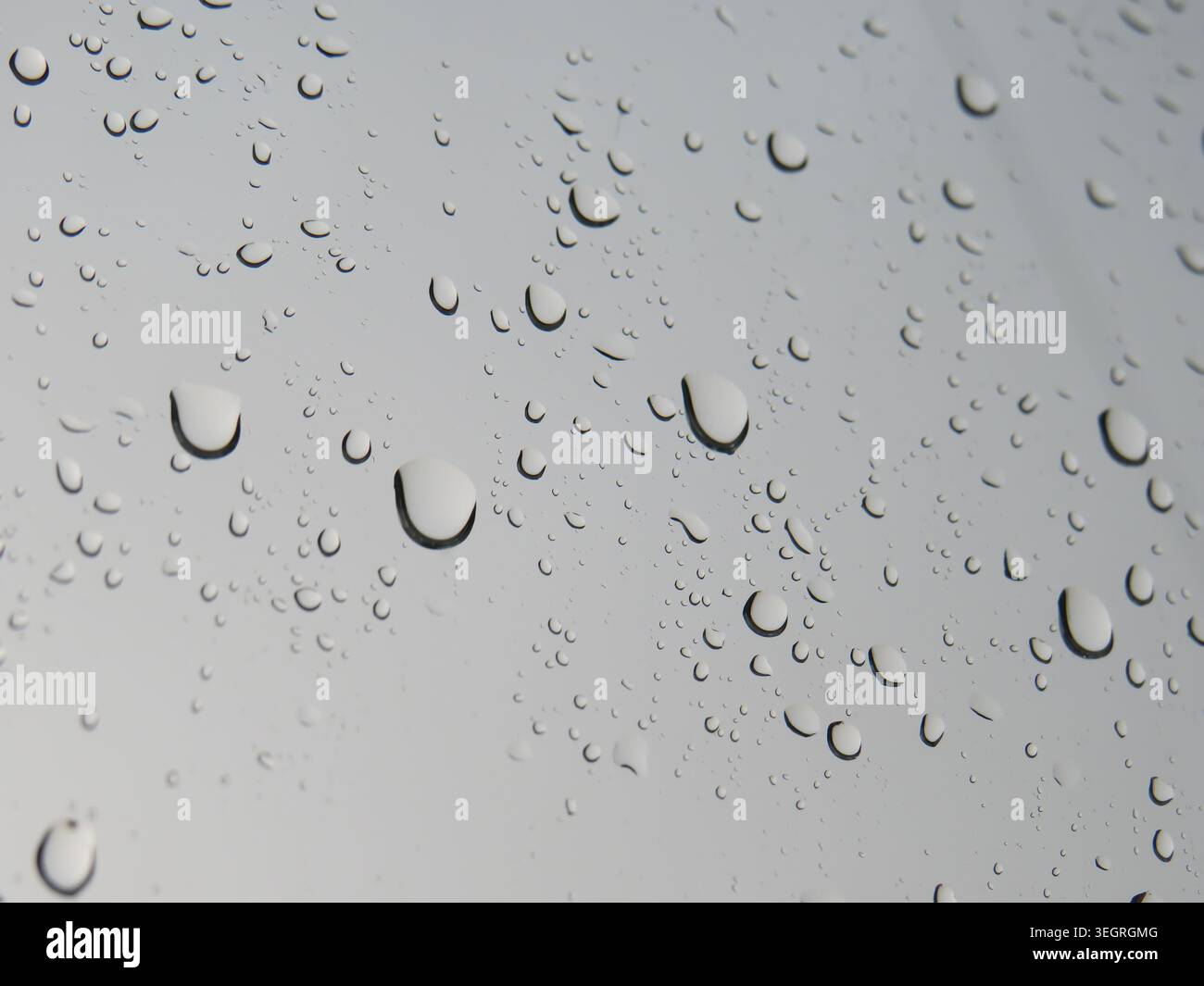 Raindrops on the window during rain Stock Photo