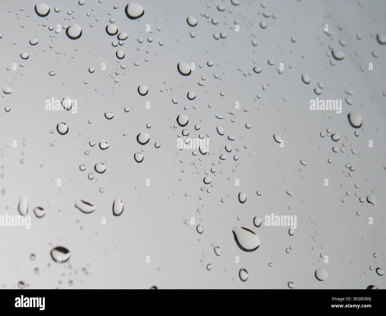 Raindrops on the window during rain Stock Photo