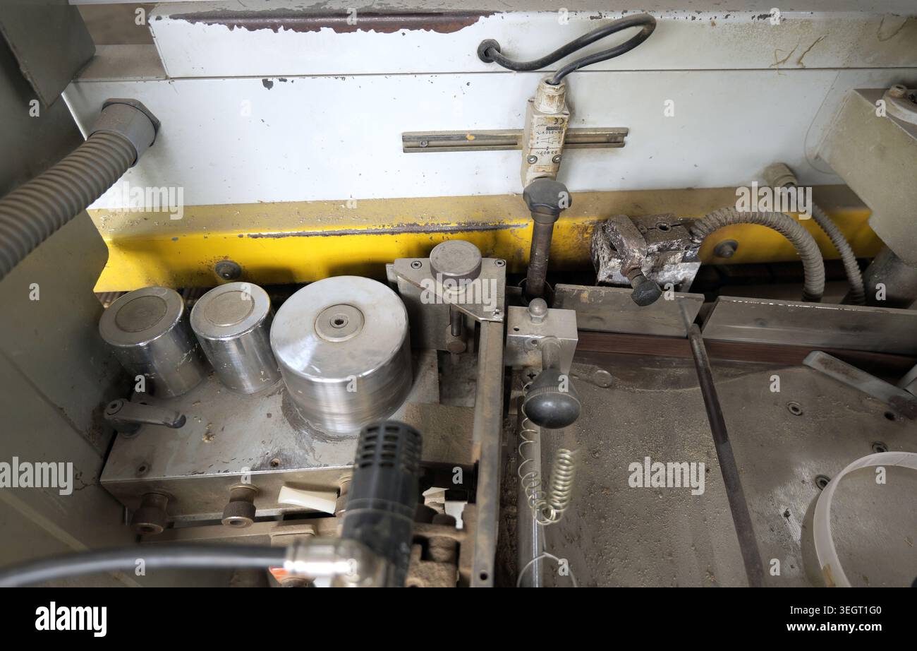 Industrial manufacturing machine showing close up details of its metal ...