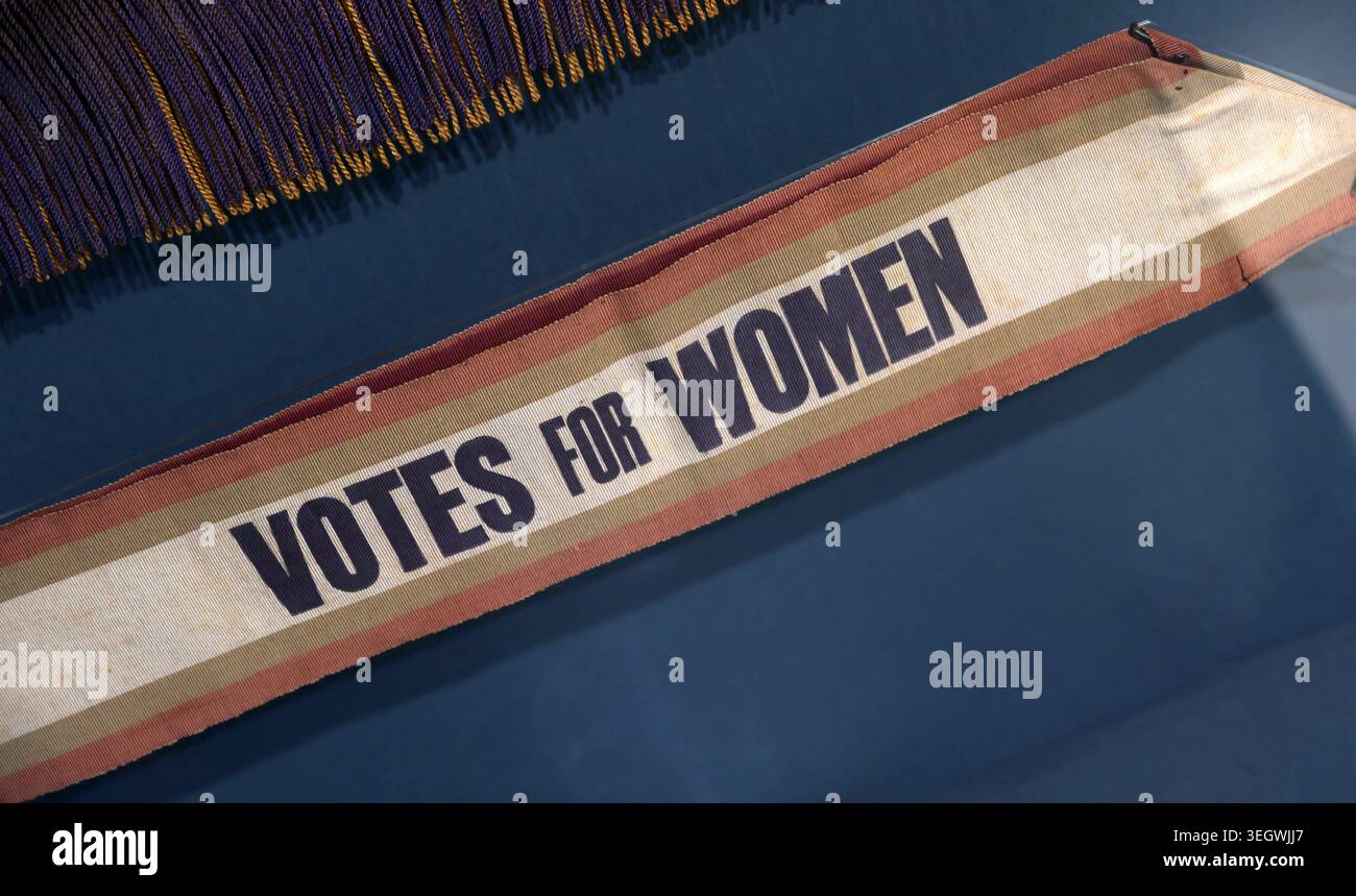 Historic Votes for Women sash in the purple, white and green colours of the Pankhurst-led British suffragette movement Stock Photo