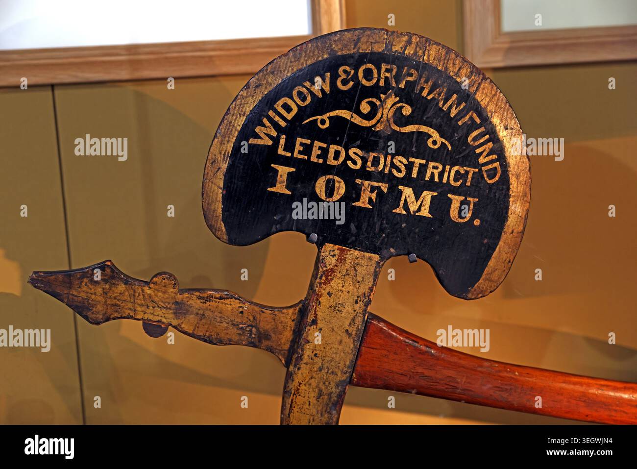 Leeds District IOMU Widow and Orphan Fund processional banner pole-top from a friendly society in Leeds, UK. Stock Photo