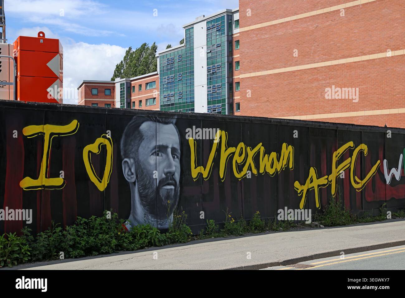 I Love Wrexham AFC supporter mural on construction hoardings beside the new Kop Stand development in Wrexham, Wales Stock Photo