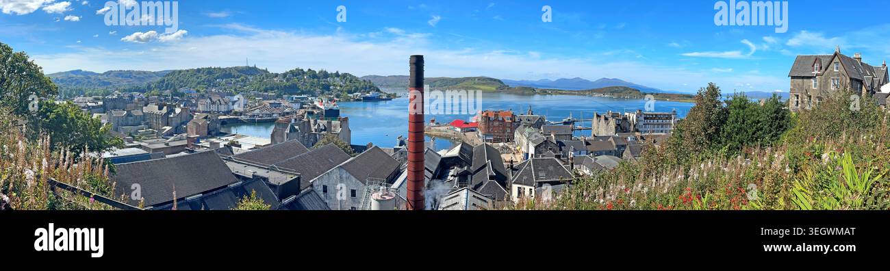 Oban Bay panorama from hillside streets above the harbour, showing Scotland’s Gateway to the Isles on a bright clear day. Stock Photo