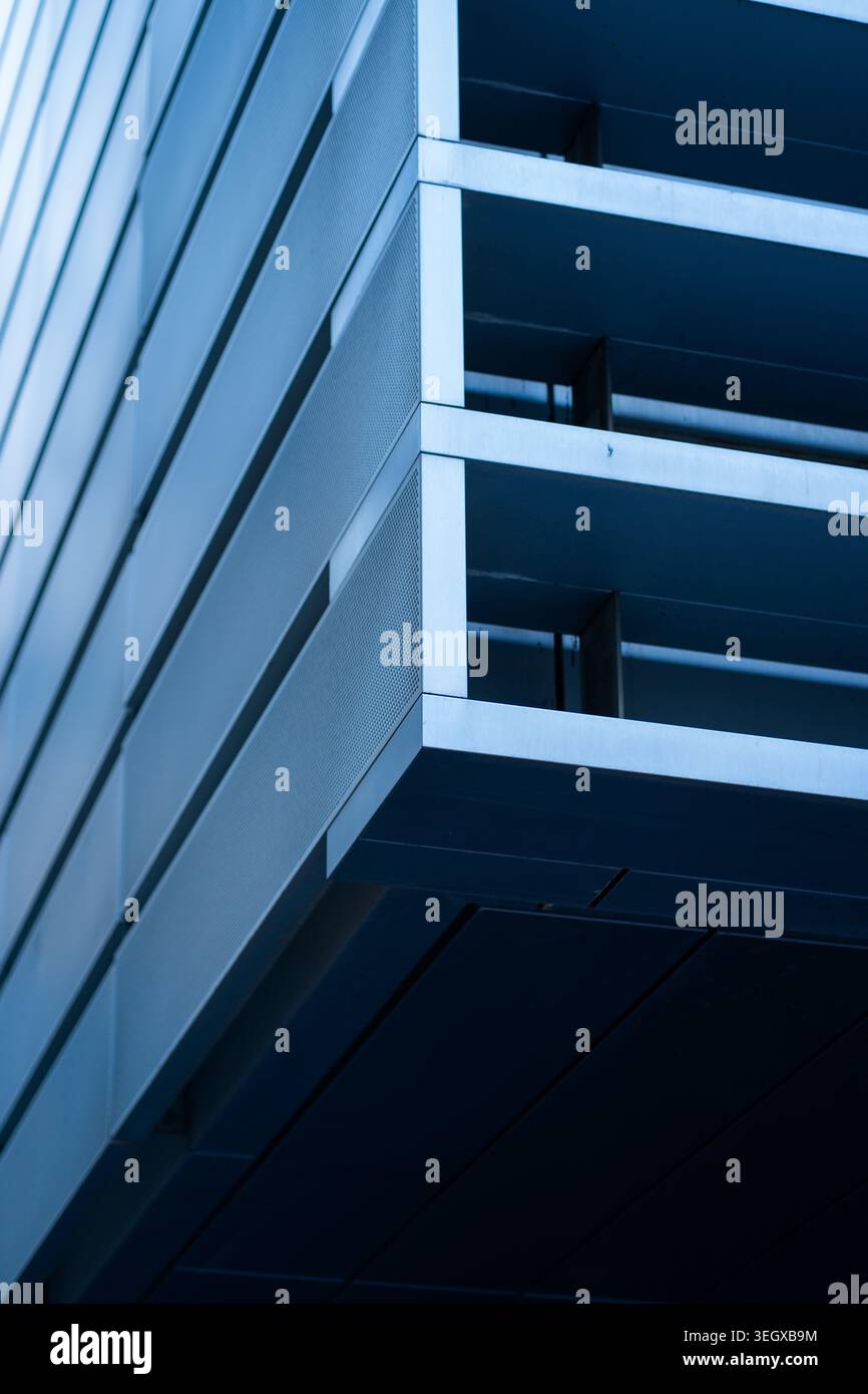 Modern architectural facade featuring geometric shapes and parallel lines Stock Photo