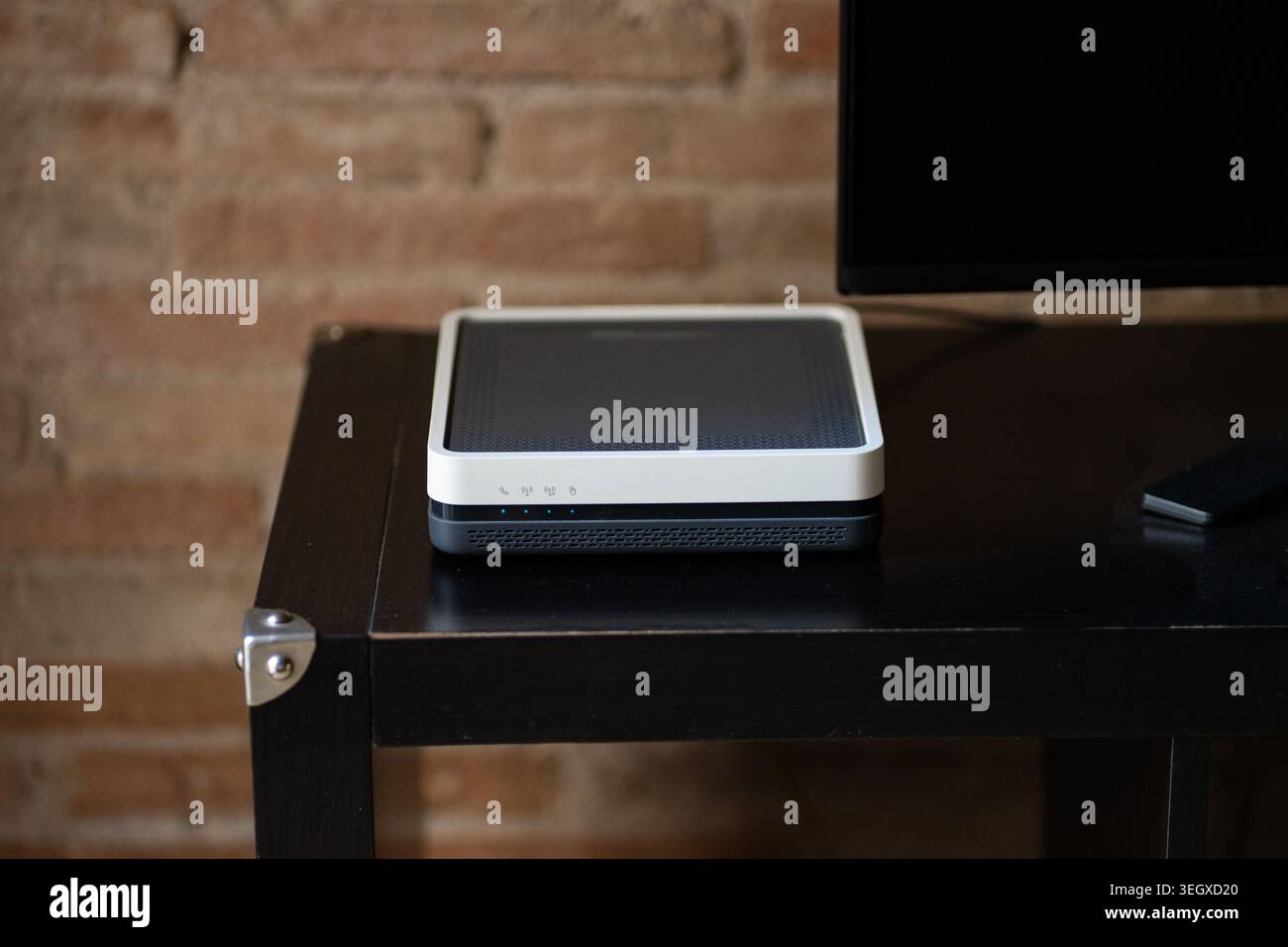 Internet router or modem providing fast broadband connection network access Stock Photo