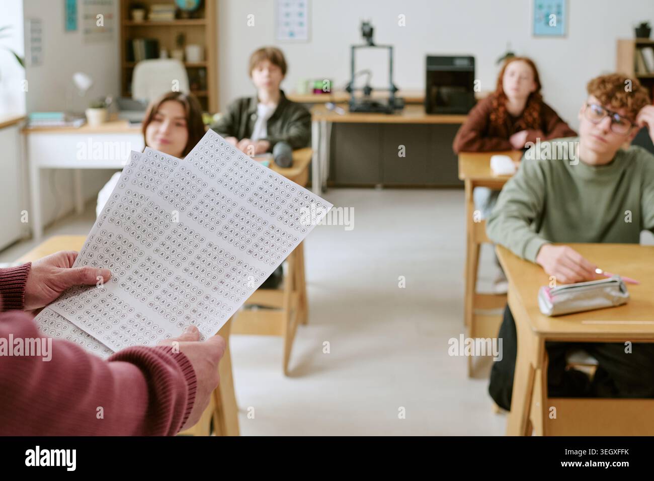 Teenage Students Taking Standardized Test in Classroom Stock Photo