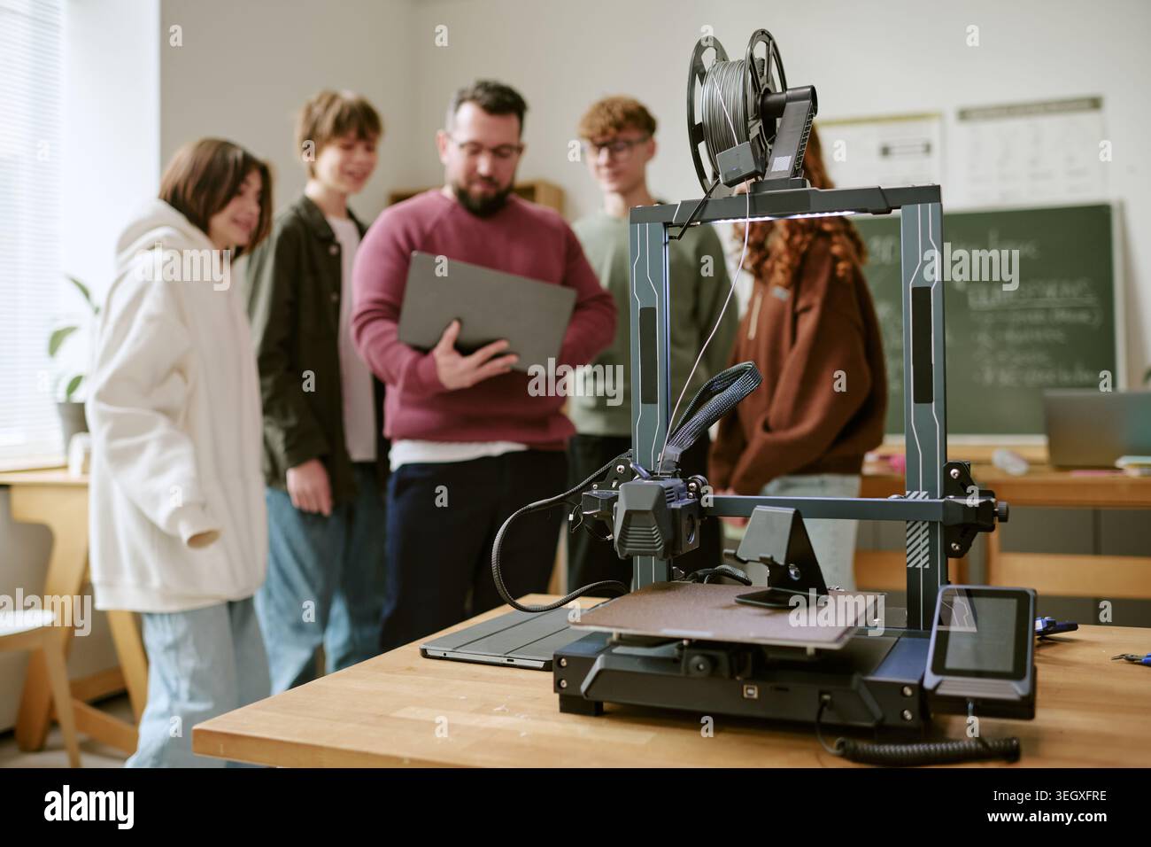 Teacher and Teenagers Learning 3d Printing in Classroom Stock Photo - Alamy