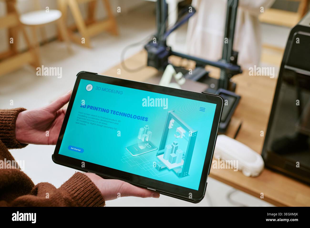 Student Using Tablet for 3d Printing Workflow and Prototyping Stock Photo