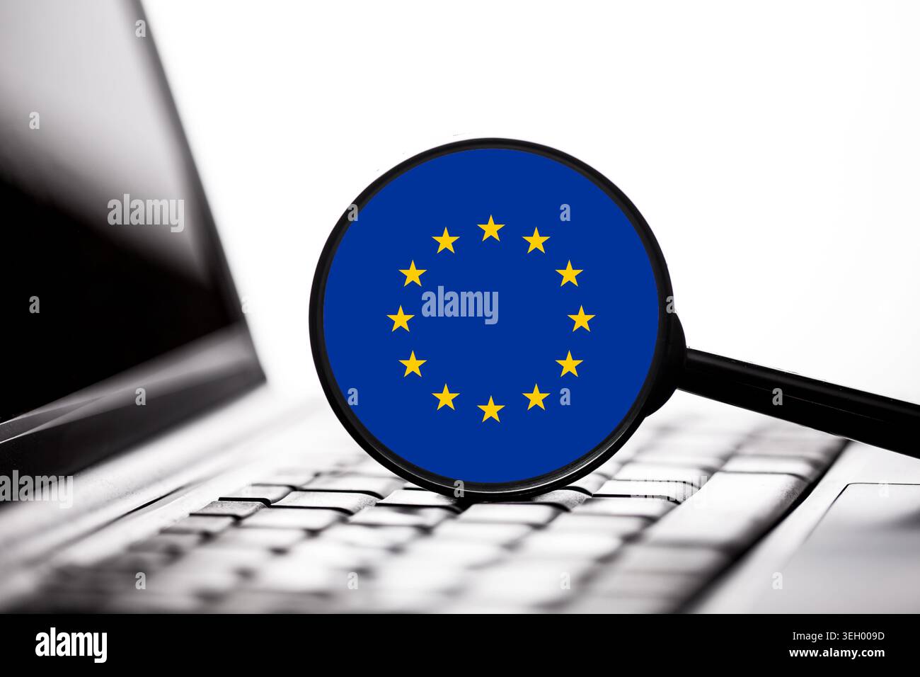 European Union symbol near laptop keyboard closeup. Digital technology and cybersecurity concept with european online communication theme. Stock Photo