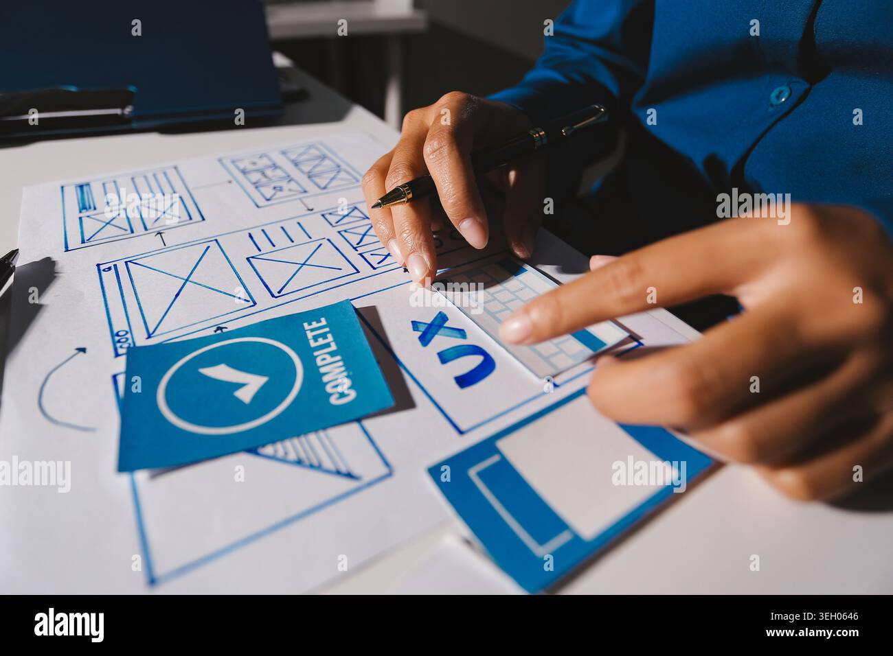 Team of Program Developer Collaborating on UXUI Design Planning in a Modern Office Environment Stock Photo